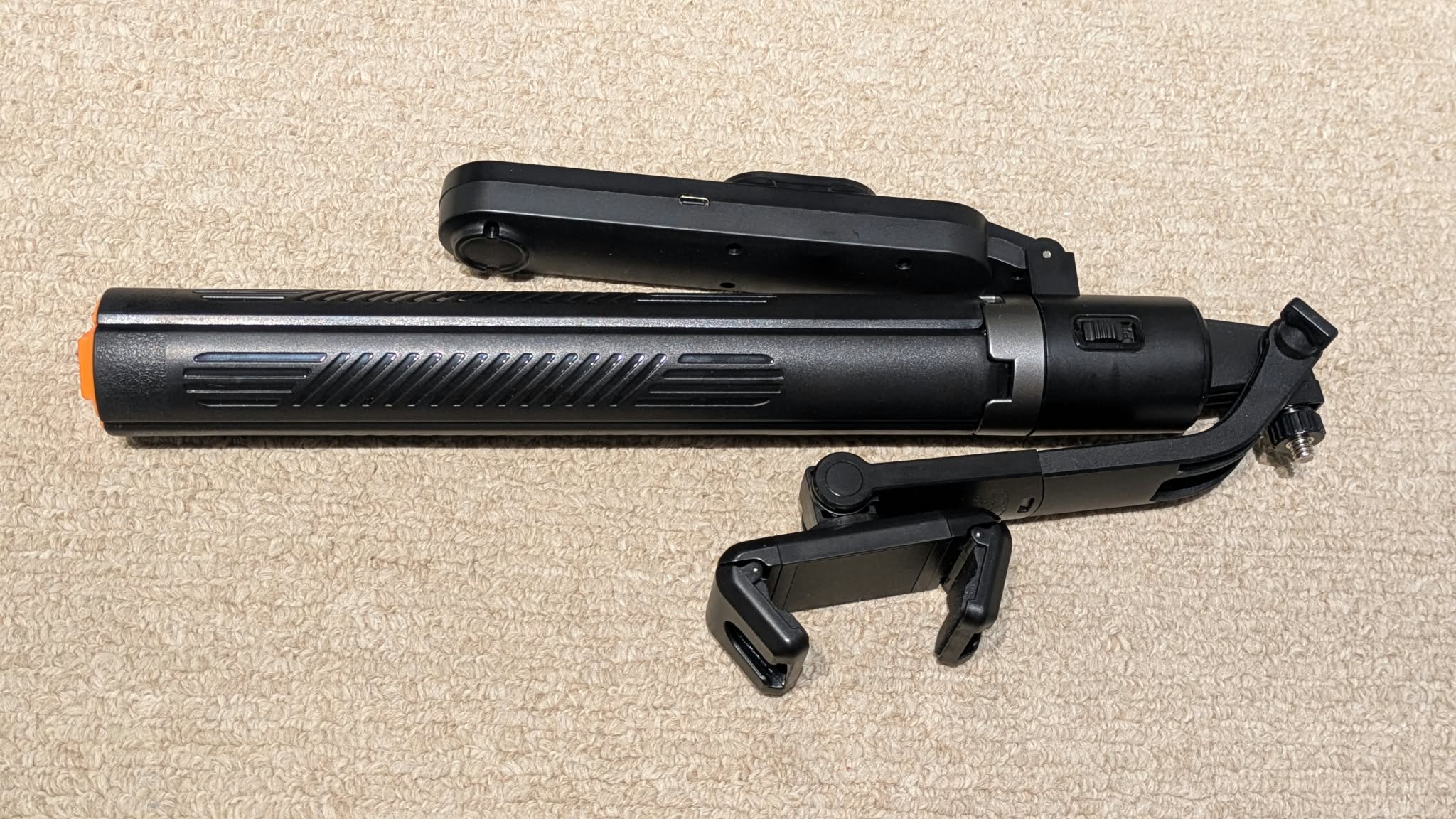 AI Tracker selfie stick folded, top view